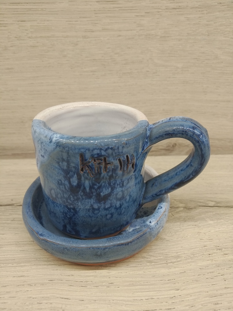 CERAMIC CUP WITH PLATE.